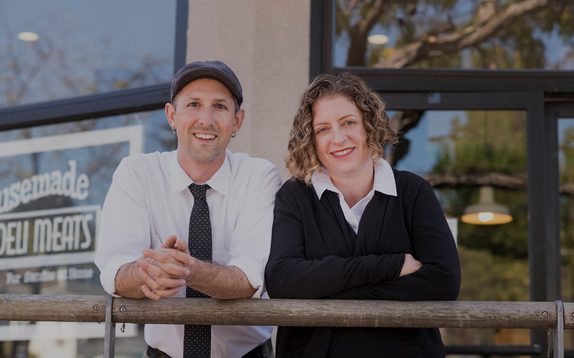 Monica and Aaron Rocchino, Former owners of The Local Butcher Shop, standing outside their former storefront?, having transitioned to employee ownership